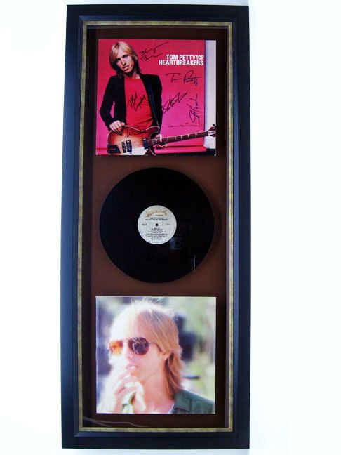 FRAMED SIGNED RECORD BY TOM PETTY AND THE HEARTBREAKERS  