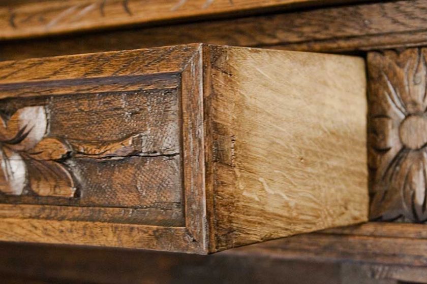 Each drawer features hand cut dovetailed joints.